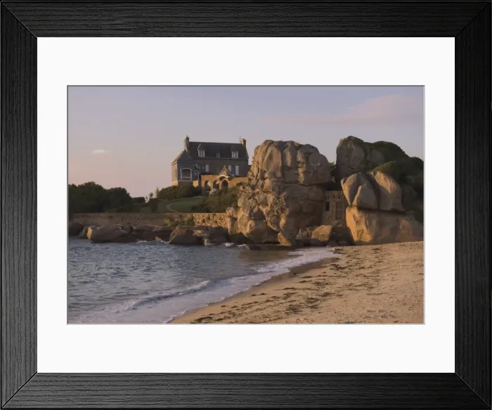 Framed Print : Beach house built behind rocks, Tregastel, Cote de Granit Rose, Cotes d Armor Framed Print : Beach house built behind rocks, Tregastel, Cote de Granit Rose, Cotes d Armor