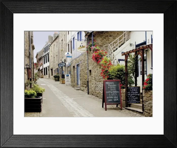 Framed Print : Narrow street with half timbered houses and seafood restaurants, Treguier Framed Print : Narrow street with half timbered houses and seafood restaurants, Treguier