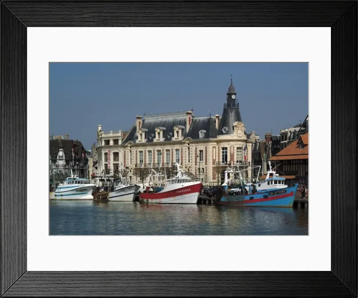 Framed Print : Hotel de Ville (town hall) and fishing boats at mouth of the River Touques Framed Print : Hotel de Ville (town hall) and fishing boats at mouth of the River Touques
