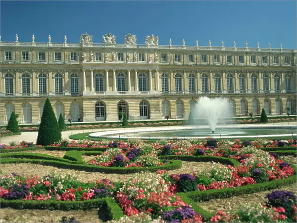 Le Parterre du Midi and fountain in front of the Chateau of Versailles