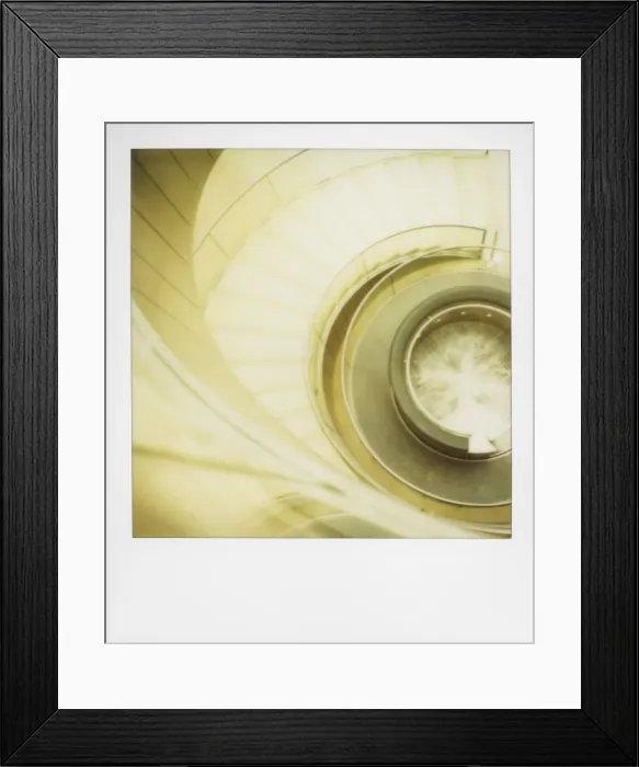 Framed Print : Polaroid of view looking down on spiral staircase in The Louvre museum Framed Print : Polaroid of view looking down on spiral staircase in The Louvre museum