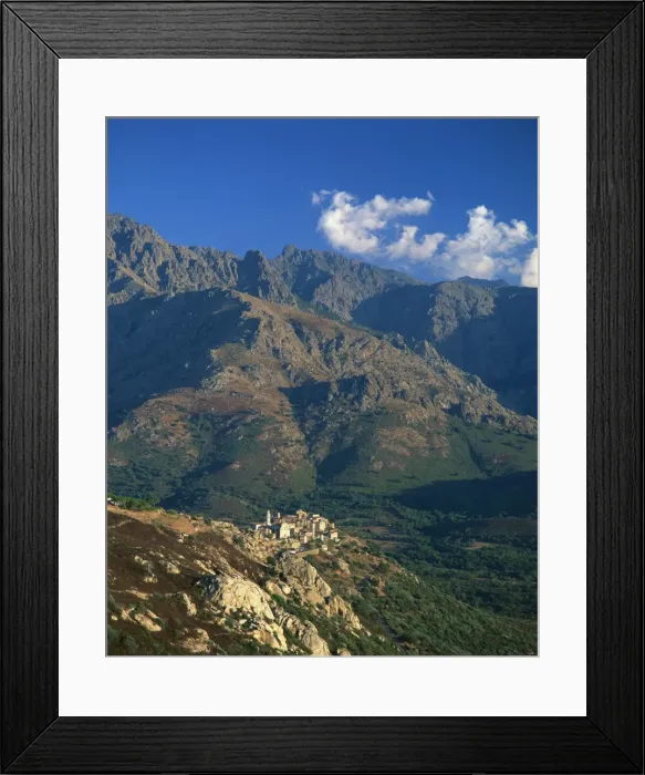 Framed Print : Aerial view over the village of Montemaggiore, clinging to hillside beneath the Monte Grosso Massif Framed Print : Aerial view over the village of Montemaggiore, clinging to hillside beneath the Monte Grosso Massif