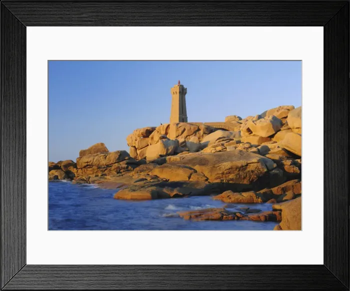 Framed Print : Lighthouse and pink granite rocks at sunset, Ploumanach, Cotes d Armor Framed Print : Lighthouse and pink granite rocks at sunset, Ploumanach, Cotes d Armor