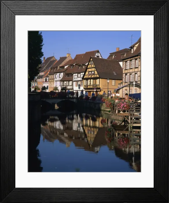 Framed Print : Timbered houses reflected in water in the evening, Petite Venise, Colmar Framed Print : Timbered houses reflected in water in the evening, Petite Venise, Colmar