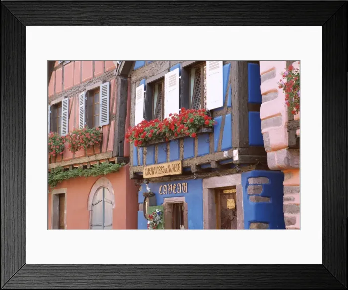 Framed Print : Exterior of blue house with windowboxes of geraniums, Niedermorschwihr Framed Print : Exterior of blue house with windowboxes of geraniums, Niedermorschwihr