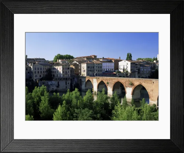 Framed Print : The Pont Vieux (old bridge) over the Tarn River, lit by the evening sun Framed Print : The Pont Vieux (old bridge) over the Tarn River, lit by the evening sun