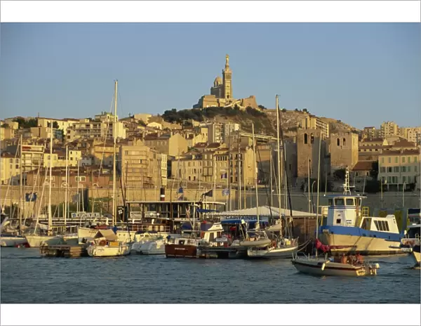 View across the Vieux Port to the basilica of Notre Dame de la Garde, Marseille