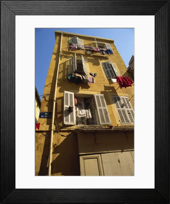 Framed Print : House with shutters and washing lines on the Rue du Panier, in the old town in Marseille Framed Print : House with shutters and washing lines on the Rue du Panier, in the old town in Marseille