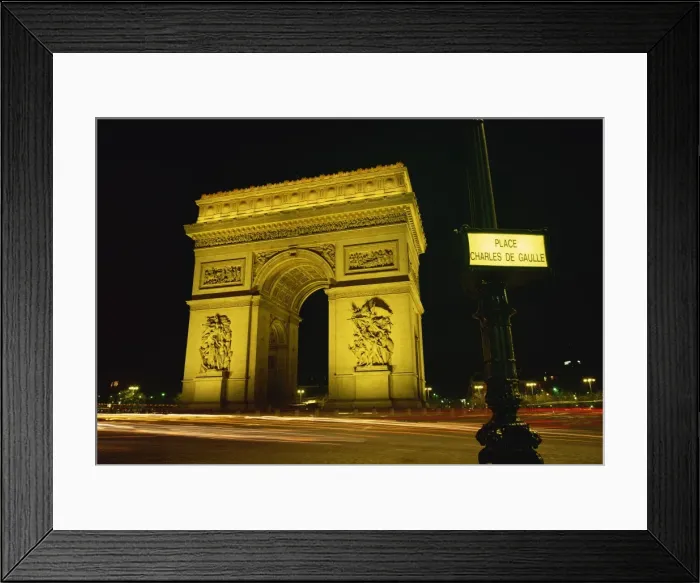 Framed Print : Place Charles de Gaulle street sign and the Arc de Triomphe illuminated at night Framed Print : Place Charles de Gaulle street sign and the Arc de Triomphe illuminated at night