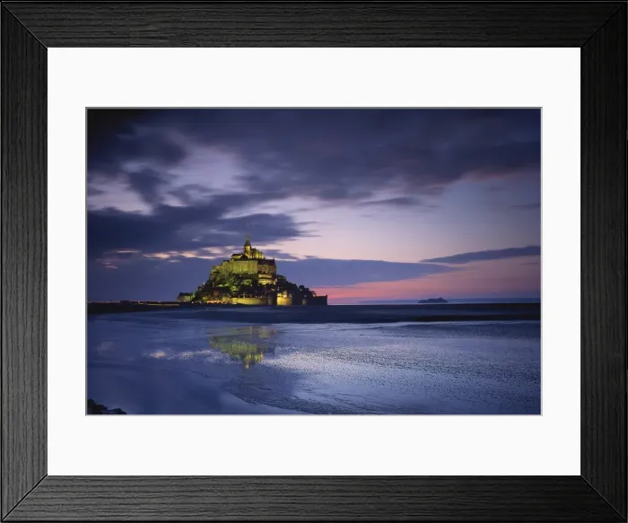 Framed Print : Mont St. Michel, UNESCO World Heritage Site, illuminated at dusk, La Manche region Framed Print : Mont St. Michel, UNESCO World Heritage Site, illuminated at dusk, La Manche region