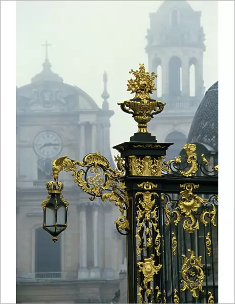 Restored gilded wrought iron work and lamp by Lamor in the Place Stanislas in Nancy