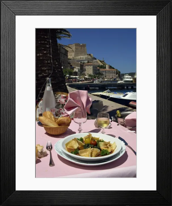 Framed Print : Meal on an outdoor table of the La Caravelle Restaurant, Bonifacio, Corsica Framed Print : Meal on an outdoor table of the La Caravelle Restaurant, Bonifacio, Corsica
