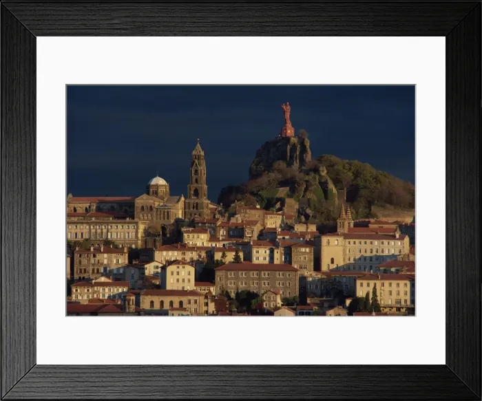 Framed Print : Houses and churches overlooked by a hilltop statue of the Virgin and child at Le Puy Framed Print : Houses and churches overlooked by a hilltop statue of the Virgin and child at Le Puy