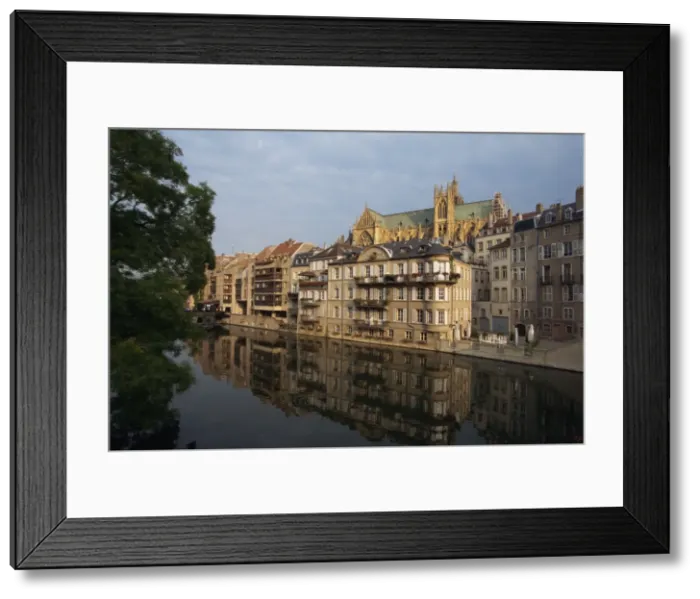 Framed Print : Reflections in water of buildings, with the Cathedral of St. Etienne in the background Framed Print : Reflections in water of buildings, with the Cathedral of St. Etienne in the background