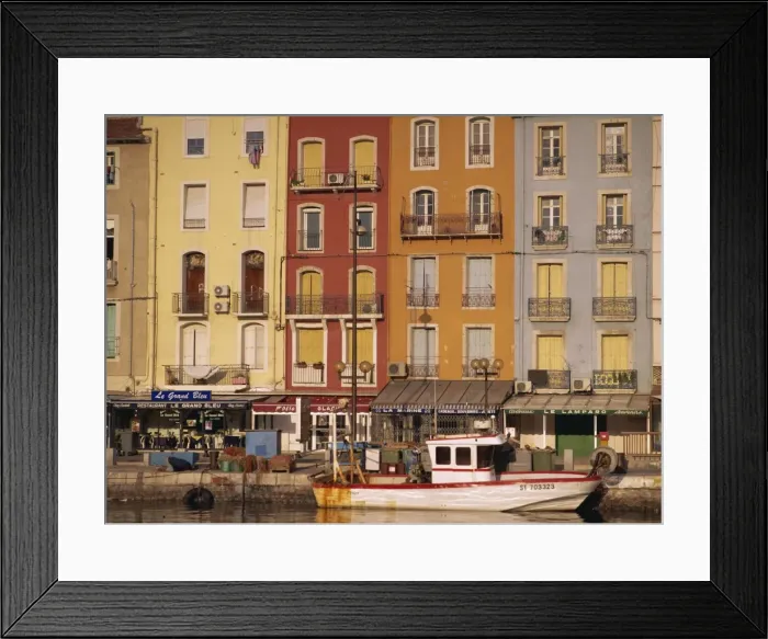 Framed Print : Boat, buildings with balconies and shops beneath on the waterfront, Sete Framed Print : Boat, buildings with balconies and shops beneath on the waterfront, Sete