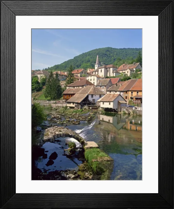 Framed Print : The weir and remains of a medieval bridge on the River Loue, with the houses Framed Print : The weir and remains of a medieval bridge on the River Loue, with the houses