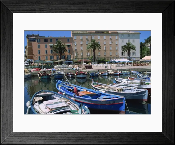 Framed Print : Fishing boats moored in the harbour and waterfront at Ajaccio, island of Corsica Framed Print : Fishing boats moored in the harbour and waterfront at Ajaccio, island of Corsica