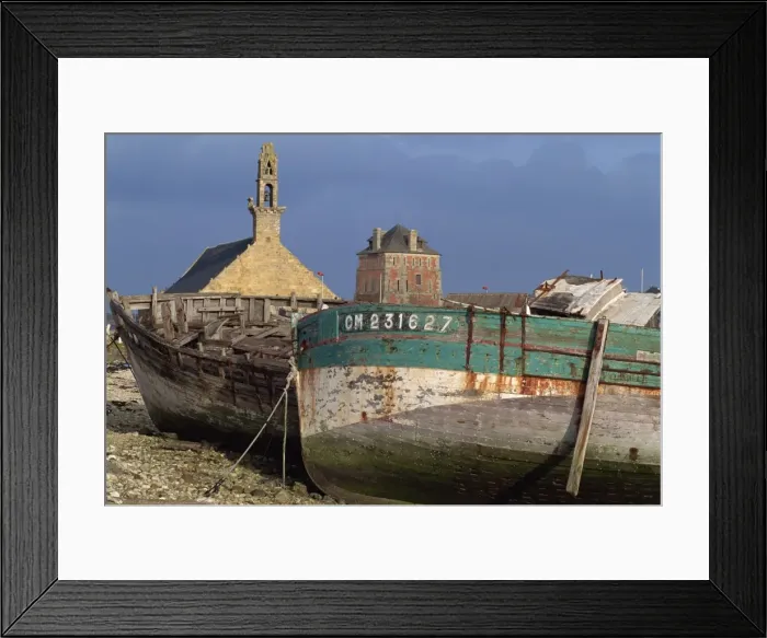 Framed Print : Old fishing boats in front of the Rocamadour chapel and Vauban tower at Camaret Framed Print : Old fishing boats in front of the Rocamadour chapel and Vauban tower at Camaret