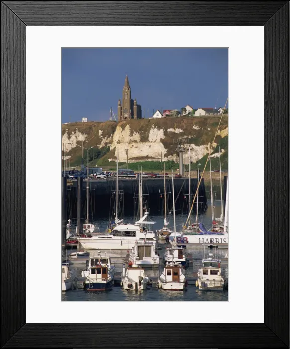 Framed Print : Boats and yachts in the harbour and church on skyline above cliffs, Dieppe Framed Print : Boats and yachts in the harbour and church on skyline above cliffs, Dieppe