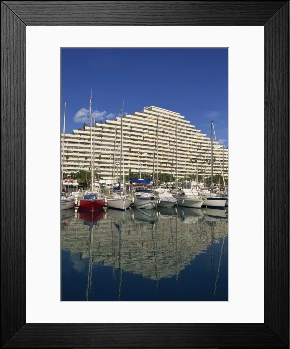 Framed Print : Reflection of boats and modern apartment block in the water of the Marina in the Baie des Anges Framed Print : Reflection of boats and modern apartment block in the water of the Marina in the Baie des Anges