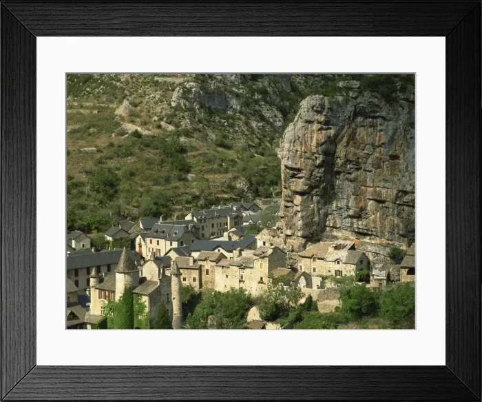 Framed Print : Houses in the village of La Malene below rock cliffs in the Tarn Gorges in the Midi-Pyrenees Framed Print : Houses in the village of La Malene below rock cliffs in the Tarn Gorges in the Midi-Pyrenees