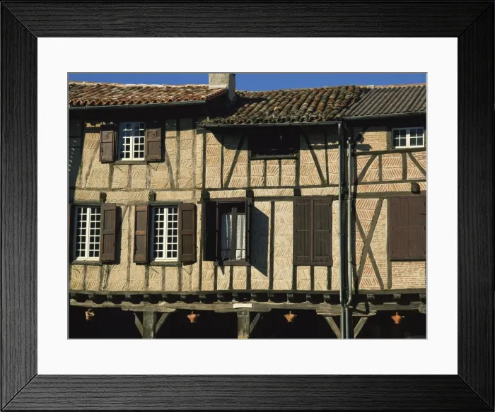 Framed Print : Exterior of timber framed houses with shutters, in Lautrec in Tarn, Midi-Pyrenees France Framed Print : Exterior of timber framed houses with shutters, in Lautrec in Tarn, Midi-Pyrenees France