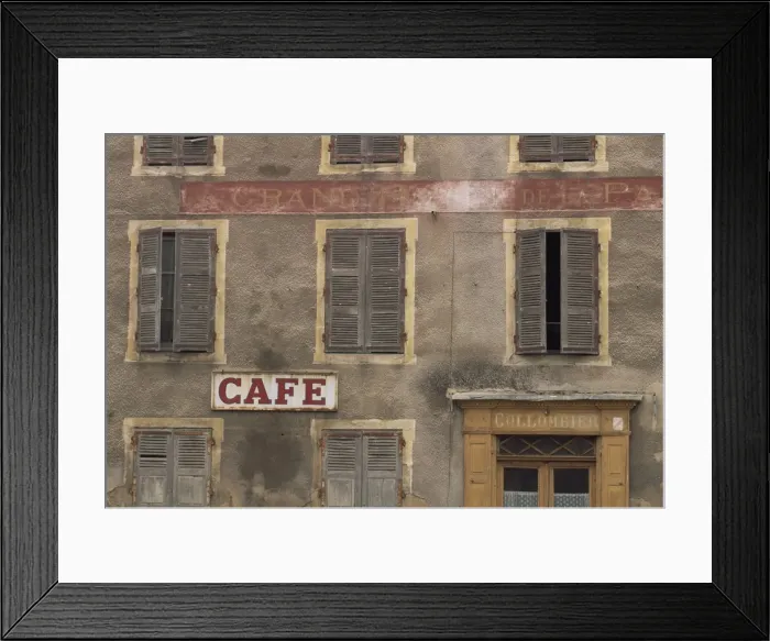 Framed Print : Cafe sign on the outside of an old hotel building with wooden shutters at Mauriac in the Auvergne Framed Print : Cafe sign on the outside of an old hotel building with wooden shutters at Mauriac in the Auvergne