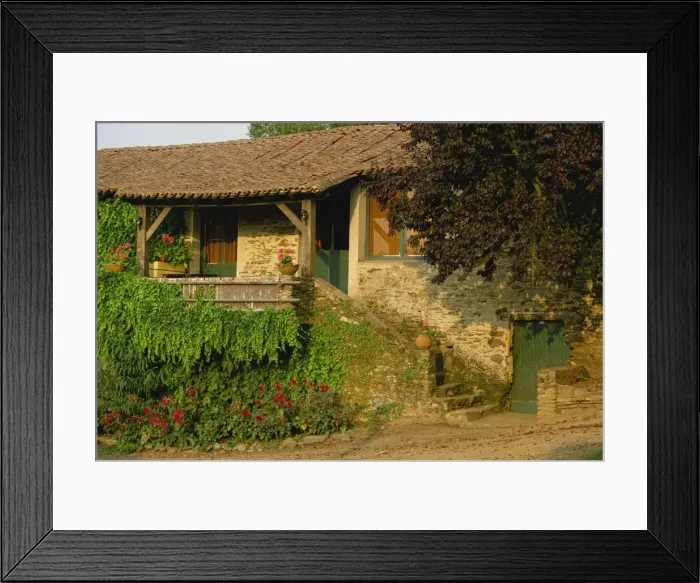 Framed Print : Exterior of a single storey cottage near Nantes in the Loire Atlantique Framed Print : Exterior of a single storey cottage near Nantes in the Loire Atlantique