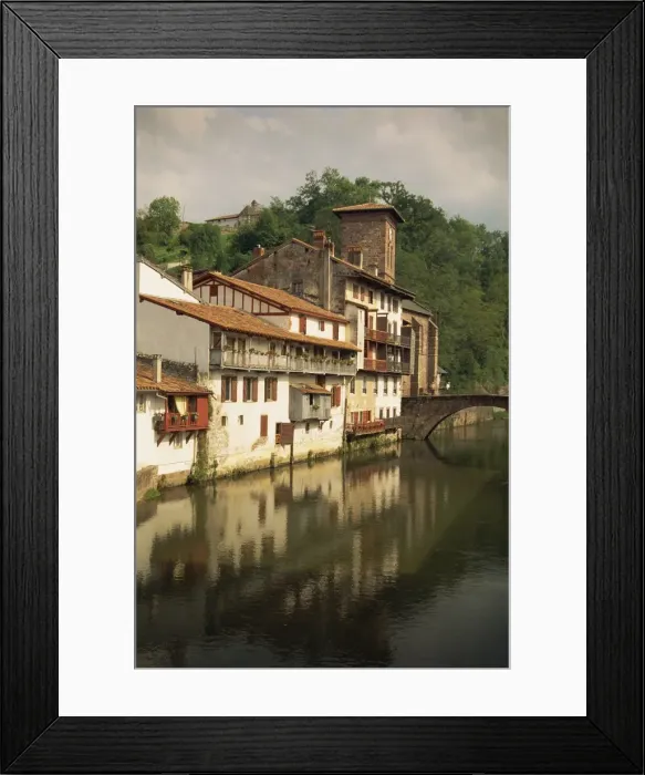 Framed Print : Tranquil scene of houses reflected in water, village of St. Jean Pied de Port in the Pyrenees Framed Print : Tranquil scene of houses reflected in water, village of St. Jean Pied de Port in the Pyrenees