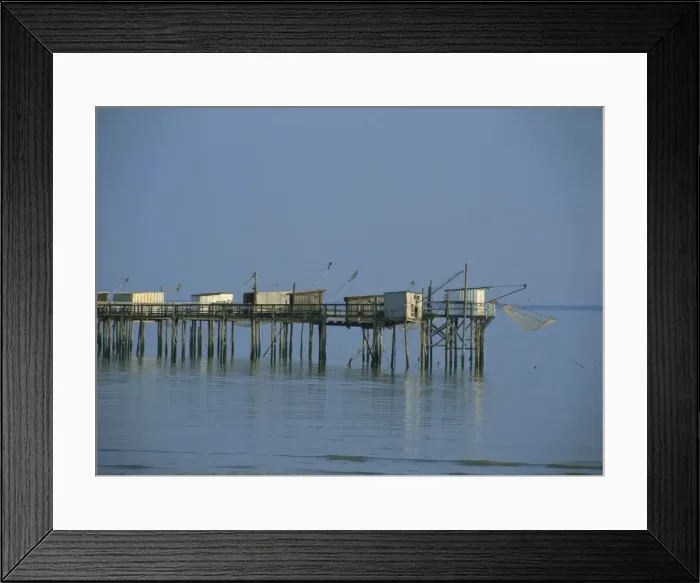Framed Print : A pier in the Gironde Estuary, Talmont, Poitou Charentes, France, Europe Framed Print : A pier in the Gironde Estuary, Talmont, Poitou Charentes, France, Europe