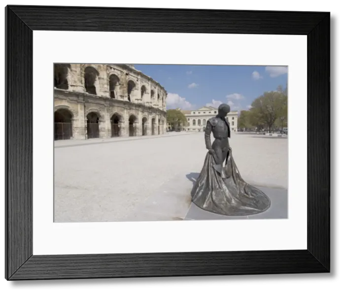 Framed Print : Roman arena with bullfighter statue, Nimes, Languedoc, France, Europe Framed Print : Roman arena with bullfighter statue, Nimes, Languedoc, France, Europe