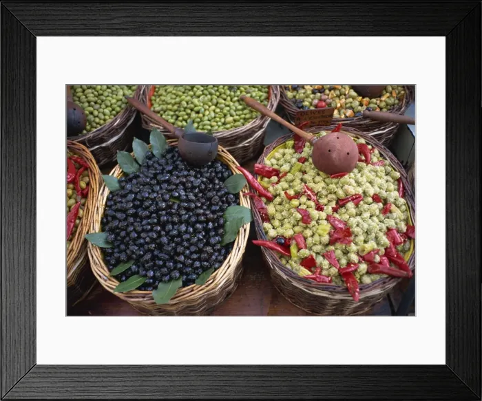 Framed Print : High angle view of baskets of black and green olives on a stall in the market Framed Print : High angle view of baskets of black and green olives on a stall in the market