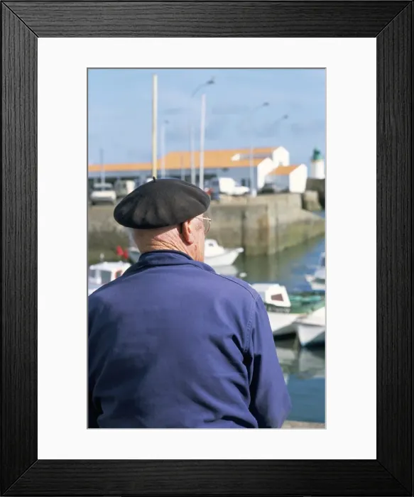 Framed Print : Man sitting on the quayside, Port Joinville Commune, Ile d Yeu, Vendee Framed Print : Man sitting on the quayside, Port Joinville Commune, Ile d Yeu, Vendee