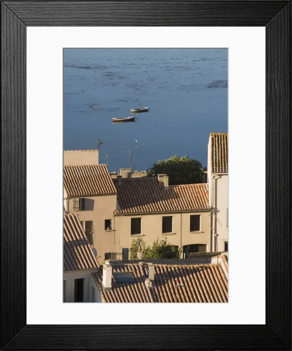 Framed Print : Fishing boats, Etang de L Ayrolle, view of rooftops from Barbarossa tower Framed Print : Fishing boats, Etang de L Ayrolle, view of rooftops from Barbarossa tower