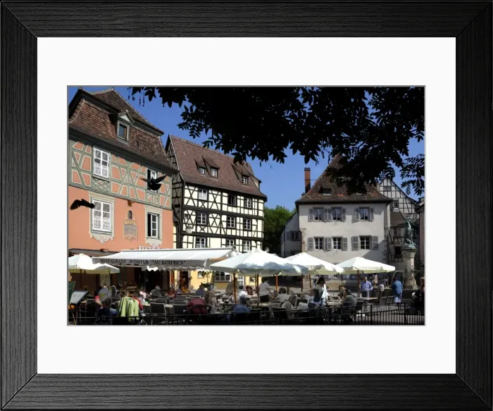 Framed Print : Half timbered and painted buildings and restaurants Framed Print : Half timbered and painted buildings and restaurants