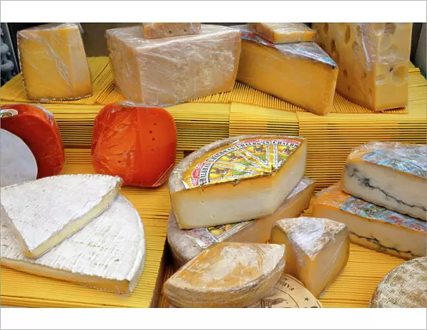 Assorted French cheeses on a market stall