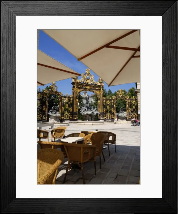 Framed Print : Restaurant and gilded wrought iron gates by Jean Lamor Framed Print : Restaurant and gilded wrought iron gates by Jean Lamor