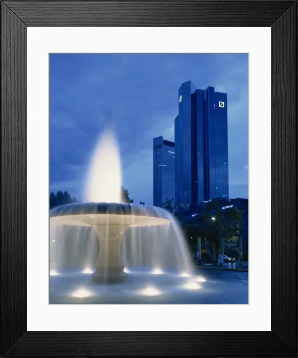 Framed Print : The Deutsche Bank with water fountain illuminated at dusk Framed Print : The Deutsche Bank with water fountain illuminated at dusk