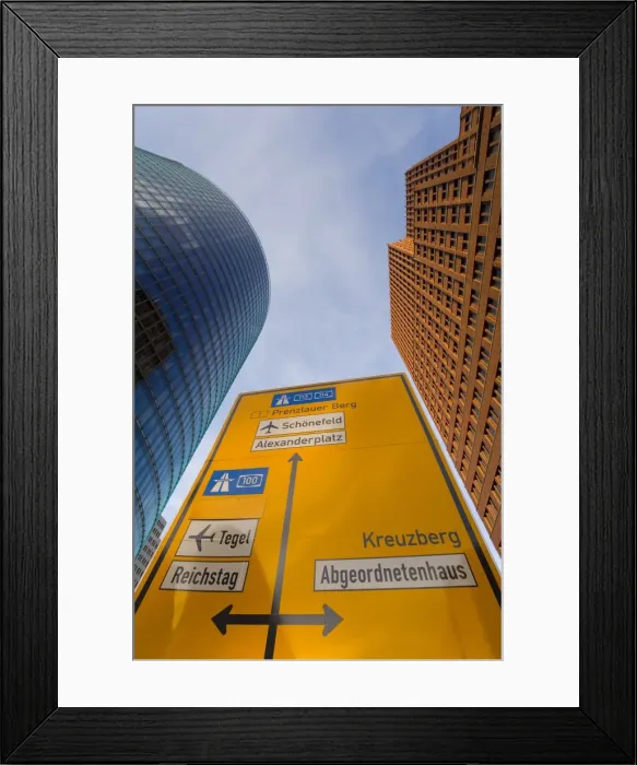 Framed Print : Low angle view of traffic sign and skyscrapers Framed Print : Low angle view of traffic sign and skyscrapers