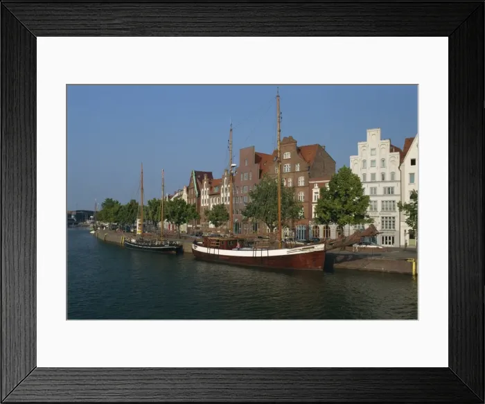 Framed Print : Boats with tall masts on the waterfront of Lubeck City Framed Print : Boats with tall masts on the waterfront of Lubeck City