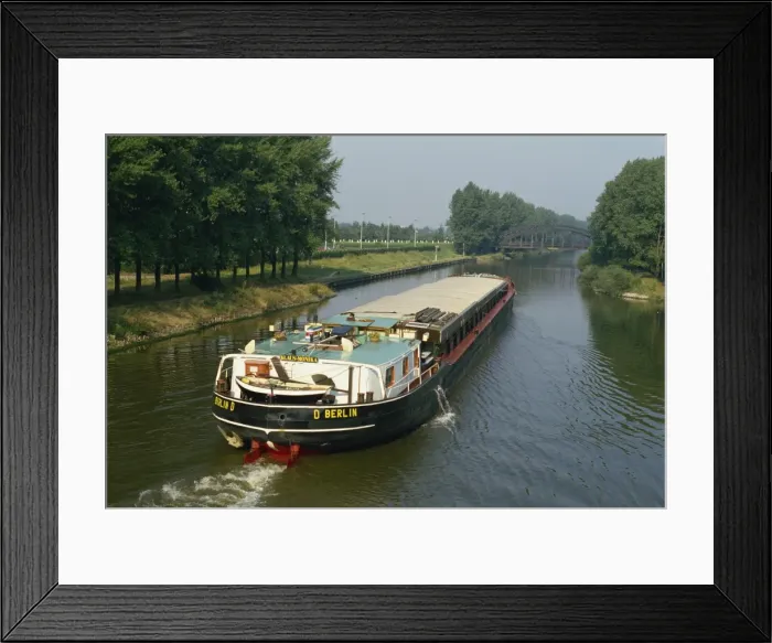 Framed Print : Large barge on canal in northern Germany Framed Print : Large barge on canal in northern Germany