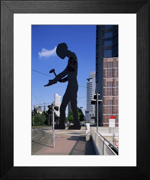 Framed Print : Statue of a hammering man Framed Print : Statue of a hammering man