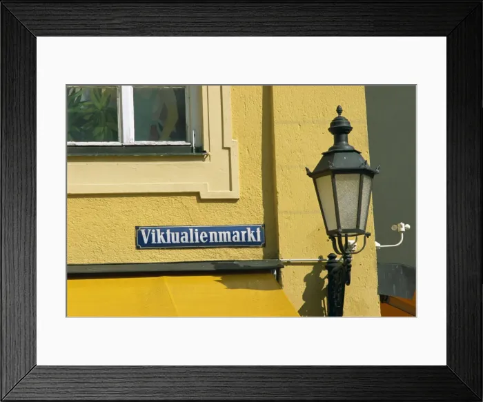 Framed Print : Street lamp and sign of the Viktualienmarkt in the city of Munich Framed Print : Street lamp and sign of the Viktualienmarkt in the city of Munich