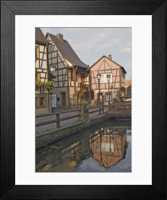 Framed Print : Original timber framed houses reflected in the mill race Framed Print : Original timber framed houses reflected in the mill race