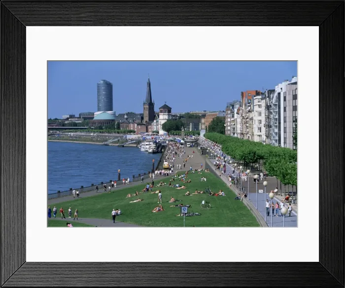 Framed Print : View over the Rheinuferpromenade along River Rhine Framed Print : View over the Rheinuferpromenade along River Rhine