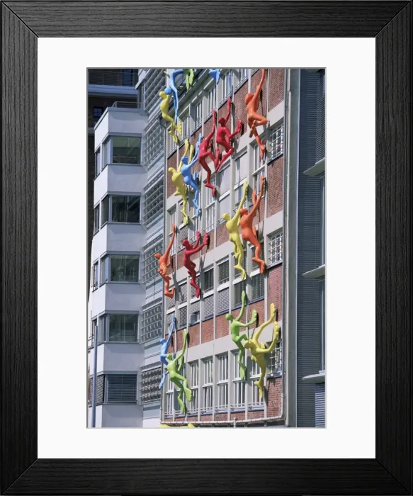 Framed Print : Flossies figures covering a building facade at the Medienhafen Framed Print : Flossies figures covering a building facade at the Medienhafen
