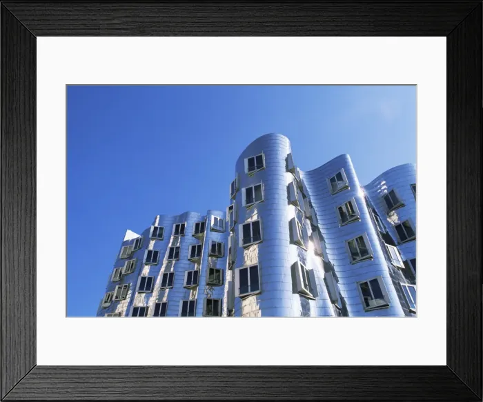 Framed Print : The Neuer Zollhof building by Frank Gehry Framed Print : The Neuer Zollhof building by Frank Gehry