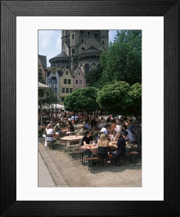 Framed Print : People sitting at an outdoors restaurant near St