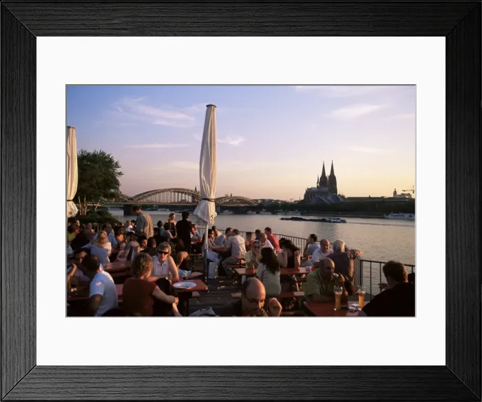 Framed Print : People sitting at the trendy Rheinterrassen bar Framed Print : People sitting at the trendy Rheinterrassen bar