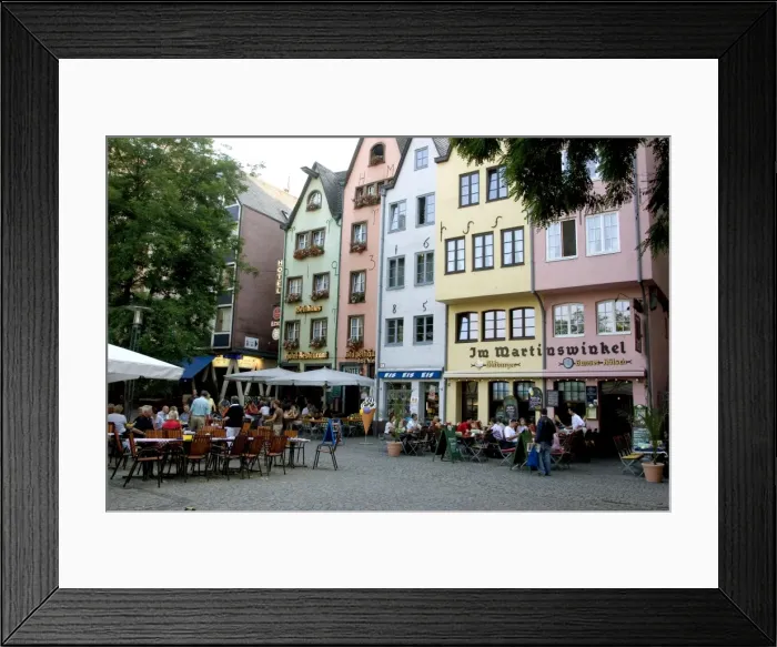 Framed Print : People sitting at outdoor restaurant in the old town Framed Print : People sitting at outdoor restaurant in the old town